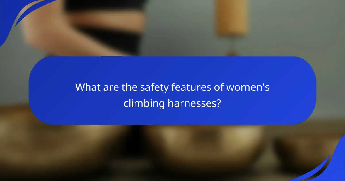 What are the safety features of women's climbing harnesses?