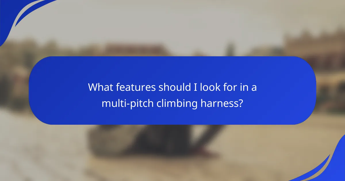 What features should I look for in a multi-pitch climbing harness?